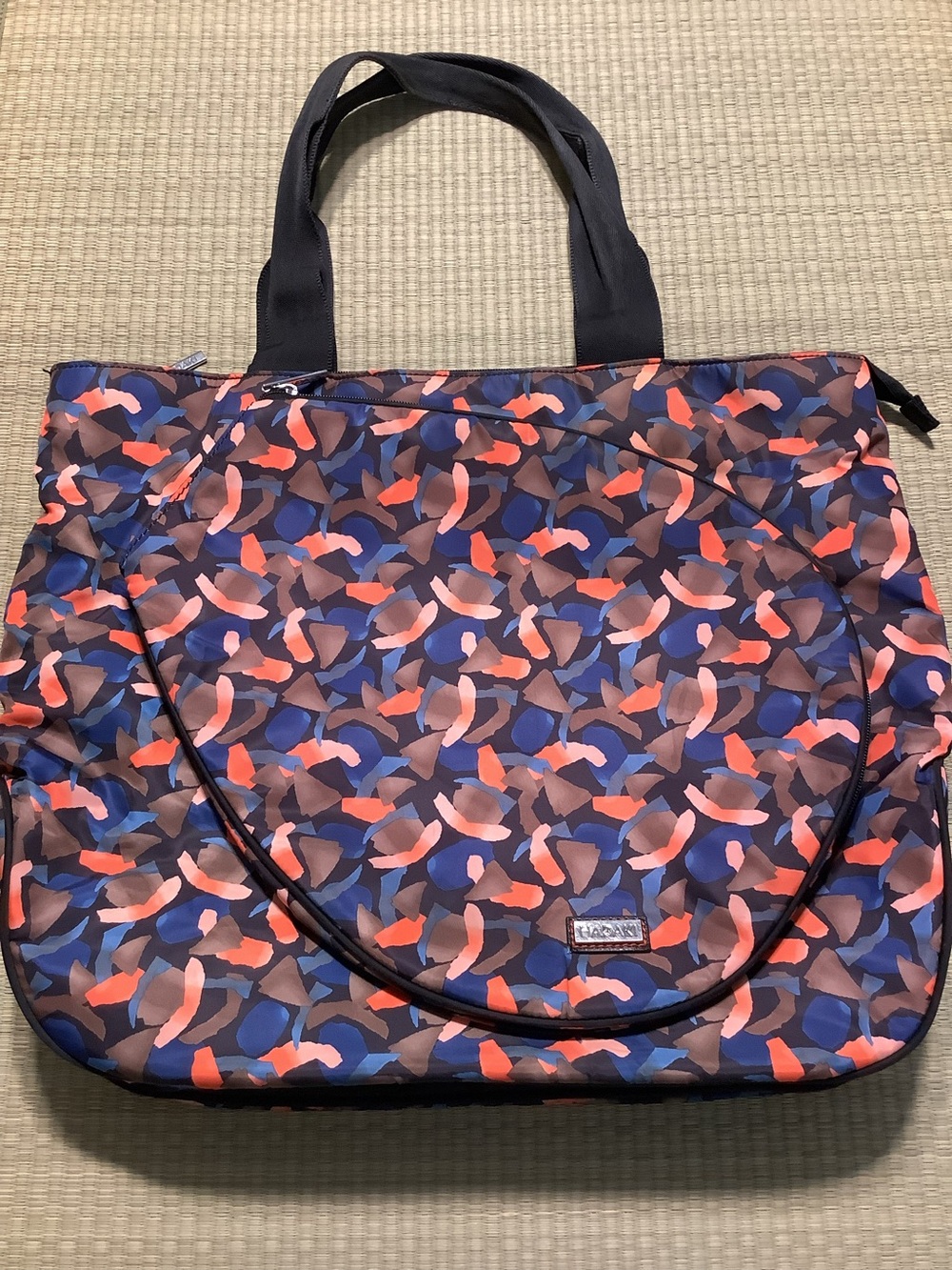 Hadaki Eco-friendly and Vegan Nylon Tennis Tote Abstract Color: Paper Mache